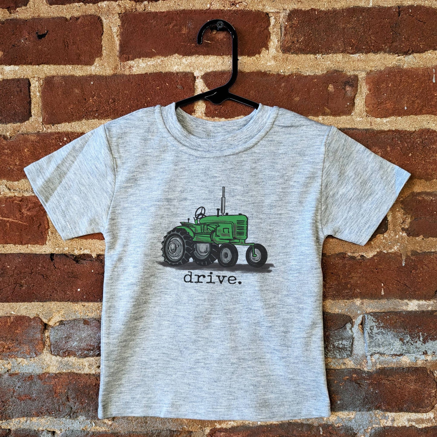 "drive." Green tractor short-sleeve tee